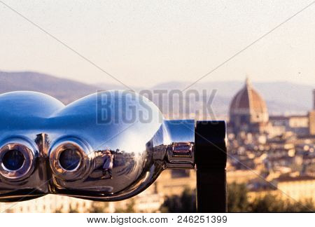 Piazzale Michelangelo. Italy - Circa March 2018 - Telescope View Of Florence As Viewed From The Inte