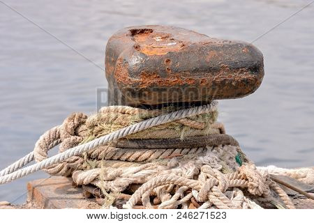 Photo Picture Of A Rusty Metal Mooring Bolard For Big Ship