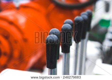 Levers Of Management Of Construction Equipment On The Tractor, The Excavator, The Grader, Etc.