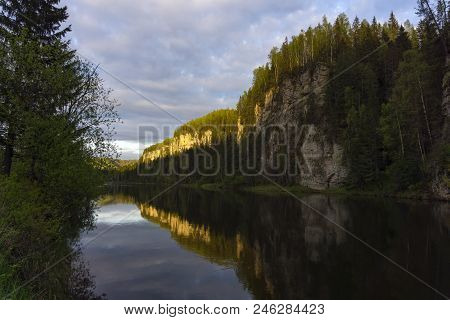 Rocky Ridge Over The Evening River, Illuminated By The Rays Of The Evening Sun (usva River, Middle U
