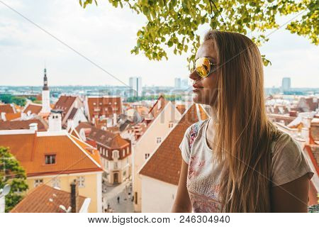 June 10, 2018. Tallinn, Estonia. Young Girl Exploring Tallinn City Including Old Town, Modern Distri