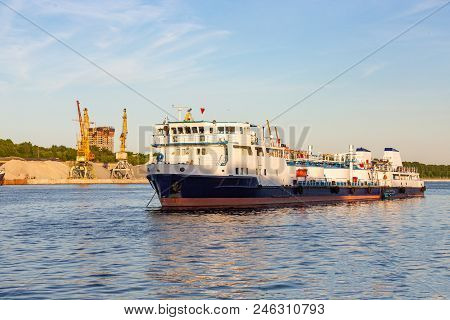 Barges And Cranes In The River Port