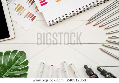 Designer Or Illustrator Workspace. Drawing And Sketching Pencils,markers, Ink Bottles Sketchbook And