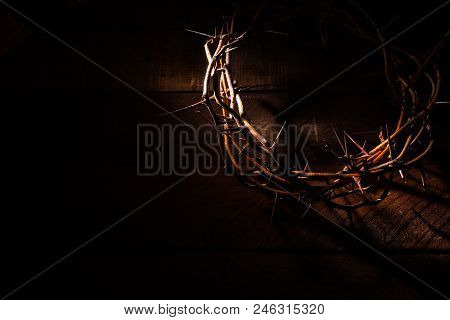An Authentic Crown Of Thorns On A Wooden Background. Easter Theme