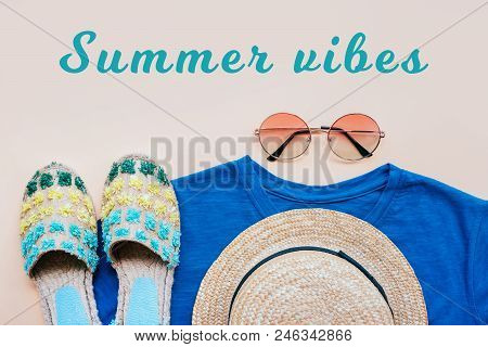 Summer Fashion Flatlay With Gradient Round Sunglasses, Straw Hat, Espadrille Sandals And T-shirt On 