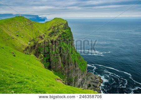 Shot Of Beautiful Panoramic Scene, Kalsoy Island and Kallur lighthouse, Faroe Islands