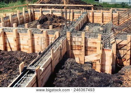 House Building Construction Site, Foudation And Cement Pouring