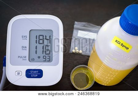 Hypertension Level Blood Pressure Measured On The Monitor Along With Blood Pressure Medication