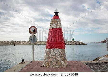 Pharos Lighthouse In Benalmadena Marina Of Malaga, Cloudy Sky
