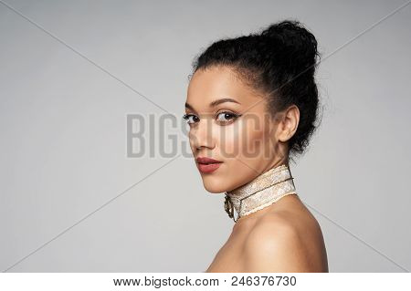 Beauty Closeup Portrait Of Beautiful Mixed Race Woman Wearing Chocker Looking At Camera, Isolated On