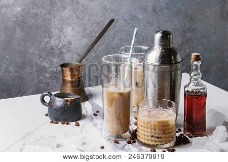 Iced Coffee Cocktail Or Frappe With Ice Cubes And Cream In Different Glasses With Jezva, Silver Shak