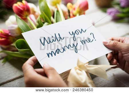 Flower bouquet with the phrase will you marry me