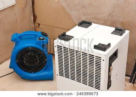 Elimination Of Water Damage With Fan And Dryer