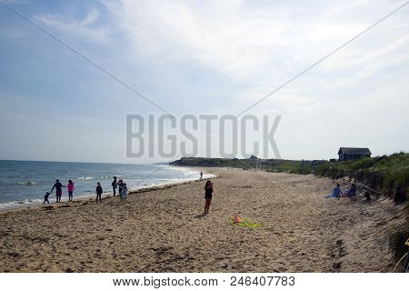 Montauk, New York-june 8: Beachgoers And Girl Seen Flying Kite On Ditch Plains Beach, Montauk, The H
