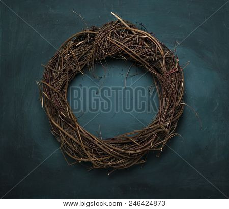 Red Easter Background. Easter Willow Wreath On Red Background. Top View, Copy Space, Toned.