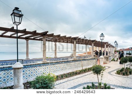 Lisbon, Portugal.- February 11, 2018: Old Town Lisbon. street view of typical houses in Lisbon, Portugal, Europe
