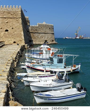 Heraklion Old Venetian Harbour With Colorful Small Fishing Boats, Yachts And Ships, Heraclion Crete,