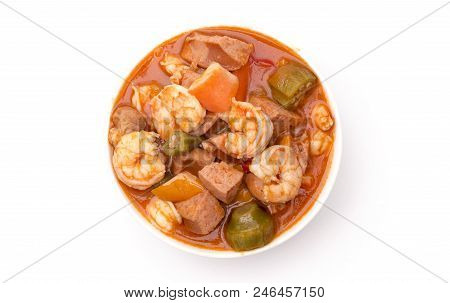 A Bowl Of Cajun Seafood Gumbo On A White Background
