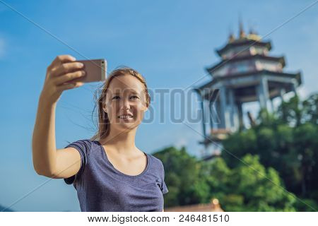 Young Woman Tourist In Buddhist Temple Kek Lok Si In Penang, Malaysia, Georgetown.