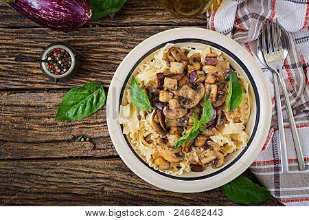 Vegetarian Pasta With Mushrooms And Aubergines, Eggplants. Italian Food. Vegan Meal. Top View. Flat 