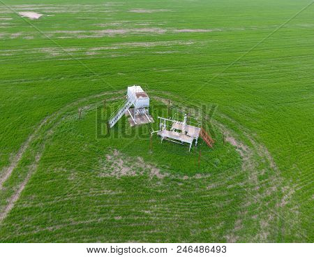 A Tank With Methanol Near The Oil Well. Equipment Of An Oil Well. Shutoff Valves And Service Equipme