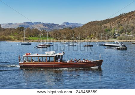 South Lakeland, Uk - April 2018: Tourist Boat Cruise At Waterhead Pier In Ambleside, A Lakeside Town