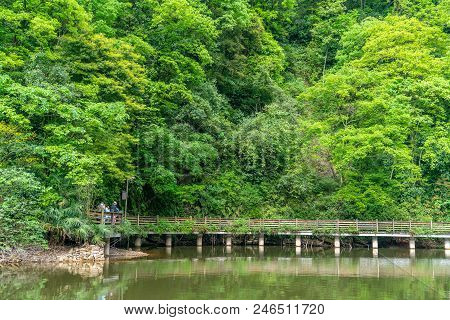 Green Water And Long Bridge In Qingcheng Mountain, Sichuan, China