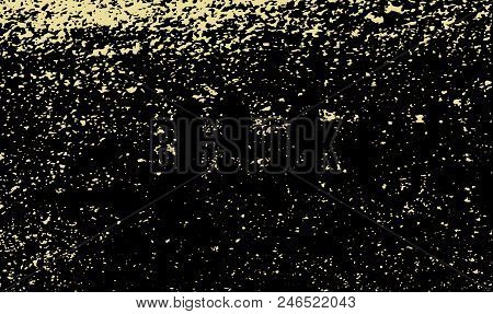 An Abstract Black And Golden Fleck Background