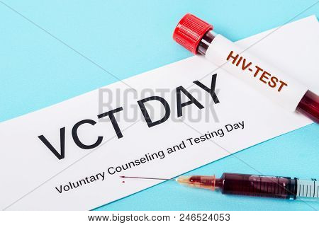 Voluntary Counseling And Testing Day With Blood In Tube And Syringe.
