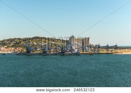 Lisbon, Portugal - May 19, 2017: Deep Water Port For Ships Transporting Grain With Large Silos, Cran