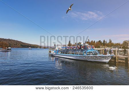 South Lakeland, Uk - April 2018: Bowness Pier With Boats For Hire And Tourist Cruises At Bowness-on-
