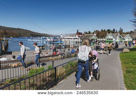 South Lakeland, Uk - April 2018: Bowness Pier With Boats For Hire And Tourist Cruises At Bowness-on-