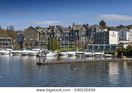 South Lakeland, Uk - April 2018: Bowness Pier With Boats For Hire And Tourist Cruises At Bowness-on-