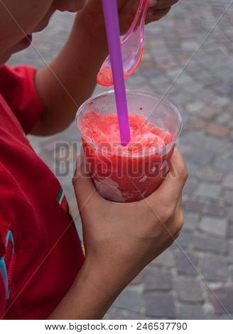 Granita To Take Away In A Plastic Cup With Pink Spoon And Lilac Drinking Straw