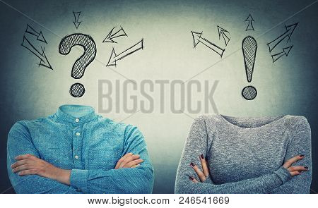 Incognito Man And Woman With Crossed Hands And Drawn Interrogation And Exclamation Marks Instead Of 