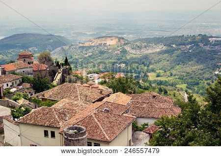 Old Buildings And Tile Roofs With View To Hills In Kruje, Albania