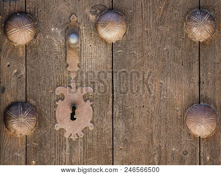 Door Of Ancient Wood With Erasures And Lock