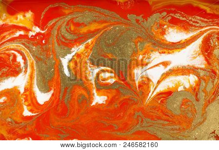 Marble Abstract Acrylic Background. Orange Marbling Artwork Texture. Agate Ripple Pattern. Gold Powd