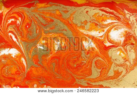 Marble Abstract Acrylic Background. Orange Marbling Artwork Texture. Agate Ripple Pattern. Gold Powd
