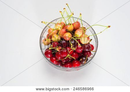 Cherries. Cherry. Cherries In Color Bowl And Kitchen Napkin. Red Cherry. Fresh Cherries. Cherry On W