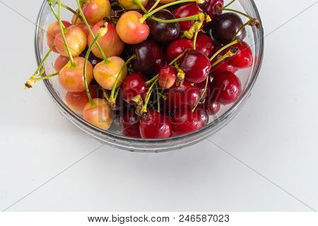 Cherries. Cherry. Cherries In Color Bowl And Kitchen Napkin. Red Cherry. Fresh Cherries. Cherry On W