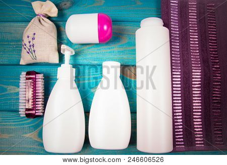 Spa Accessories For Hygenic And Bath In A Composition On A Blue Background.