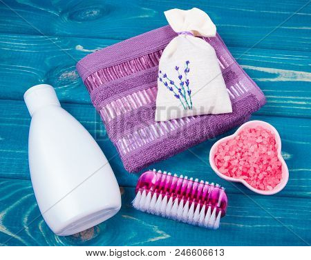 Spa Accessories For Hygenic And Bath In A Composition On A Blue Background.