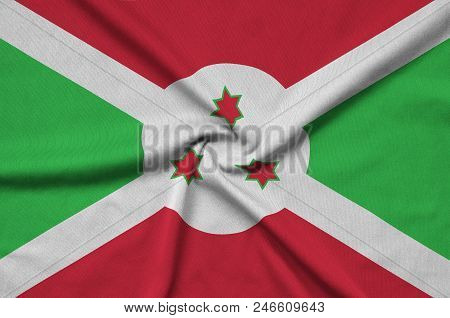 Burundi Flag  Is Depicted On A Sports Cloth Fabric With Many Folds. Sport Team Waving Banner