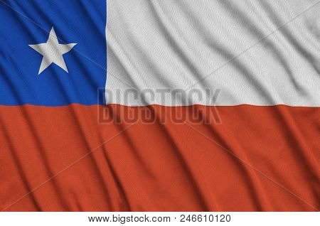 Chile Flag  Is Depicted On A Sports Cloth Fabric With Many Folds. Sport Team Waving Banner