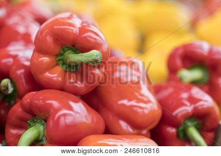 Red Pepper On Street Market Shelf. Red Bell Pepper Pattern. Background Of Fresh Sweet Heap Of Red Pe