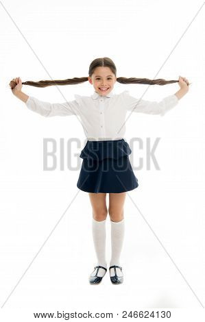 Happy Kid Show Long Brunette Hair Isolated On White. Fashion Girl Smile With New Hairstyle. Proud Of