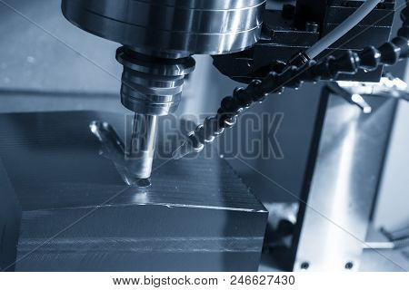 The Cnc Milling Machine Cutting The Mold Part In Roughing   Process With The Index-able Radius End-m