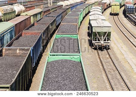 Rail Cars Loaded With Coal, A Train Transports Coal.