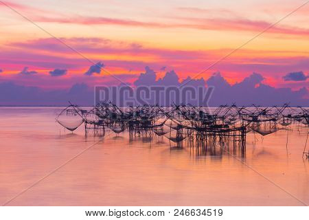 Golden Sky Above Fishing Trap In Pak Pra Talay Noi Sea Phatthalung South Of Thailand